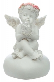 Engel mit Rosenkranz im Haar und einer LED-Kugel in der Hand