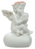 Engelfigur mit Rosenkranz im Haar und einer LED-Kugel in der Hand