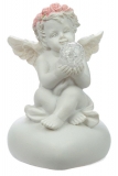 Engel mit Rosenkranz im Haar und einer LED-Kugel in der Hand